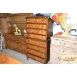 A walnut chest on chest fitted eight drawers