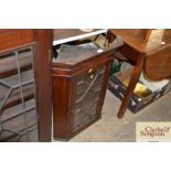 A mahogany astragal glazed hanging cabinet