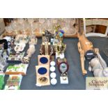 A collection of various golfing trophies