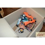 A box containing vintage Action Men and various ac