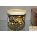 A jar of WW2 brass naval buttons