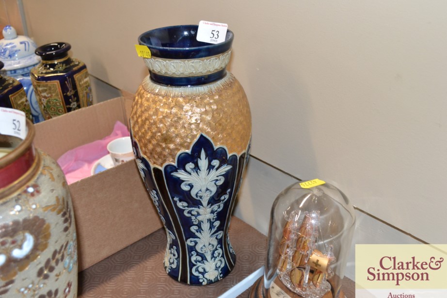 A Royal Doulton blue and gilt decorated vase