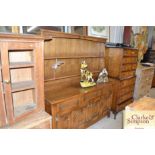A reproduction oak dresser fitted shelved and boar
