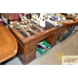 A late Victorian mahogany pedestal writing desk