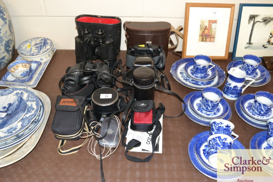 A quantity of cameras and binoculars to include Mi