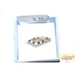 Two silver multi stone set rings