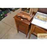 An Edwardian inlaid mahogany bedside cupboard