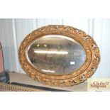 A gilt framed bevel edged wall mirror