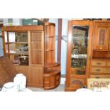 A pair of Nathan teak corner units