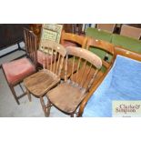 A pair of Victorian elm seated stick back kitchen