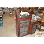 A mahogany leaded glazed cabinet