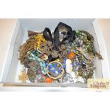 A box of various costume jewellery