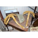 A pair of gilt French wall shelves with marble top