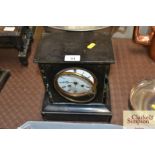 A Victorian marble cased mantel clock