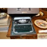 A Remington portable typewriter in fitted case