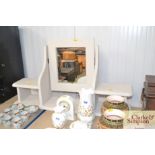 A painted swing toilet mirror