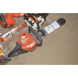 A Flymo petrol hedge trimmer