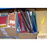 A box of loose leaf folders