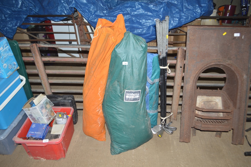 Three bags containing a tent etc