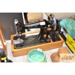 A Singer hand sewing machine