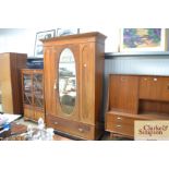 An Edward inlaid mahogany wardrobe