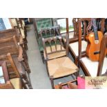 A pair of brown painted string seated chairs