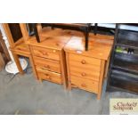 A near pair of pine bedside chests fitted three dr