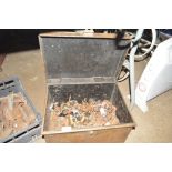 A metal log box and contents of castors