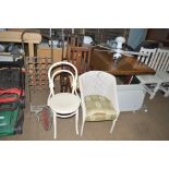 Two dining chairs; a bentwood chair and a wicker c