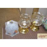 Two glass globe candle holders; and a 1930's glass