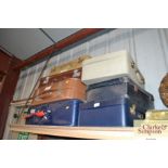 A quantity of various vintage and later suitcases