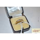 An 18ct gold ring (marks rubbed) size K set with