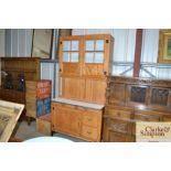 An oak and enamel kitchen dresser