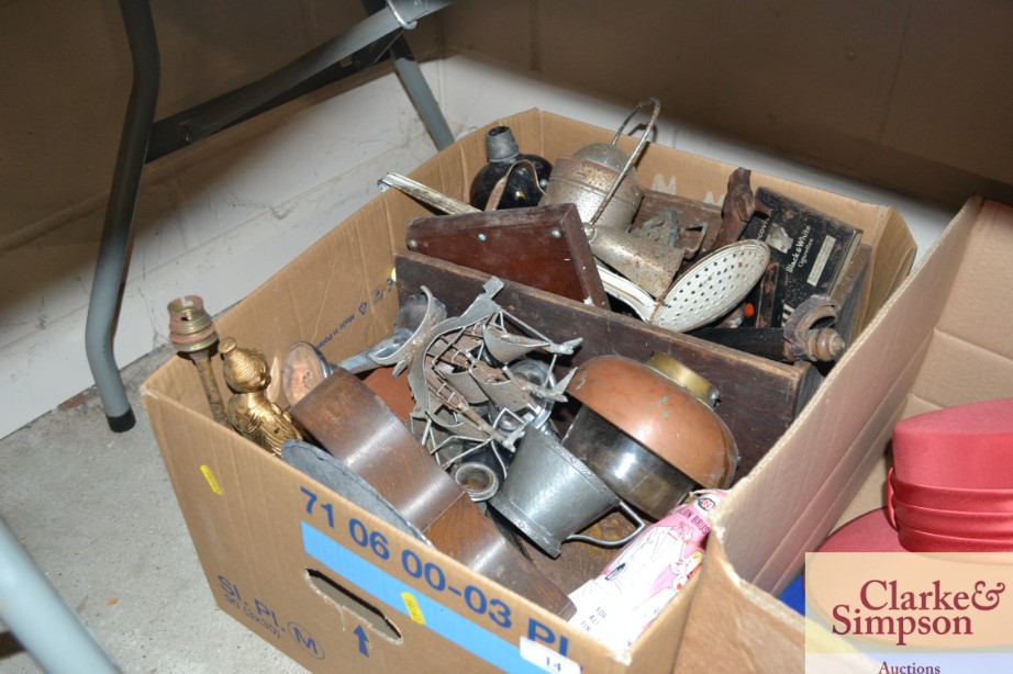 A box of various metal ware