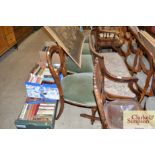 A set of four Victorian walnut balloon back dining