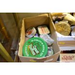 A box containing vintage tins etc.