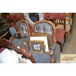 A pair of French style walnut armchairs