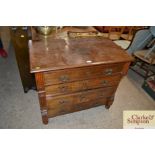 A Victorian walnut chest fitted four long drawers