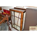 A walnut china display cabinet