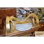 A pair of gilt and marble topped console tables