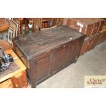 An antique oak coffer