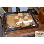 Three various wooden tea trays and a cheese board