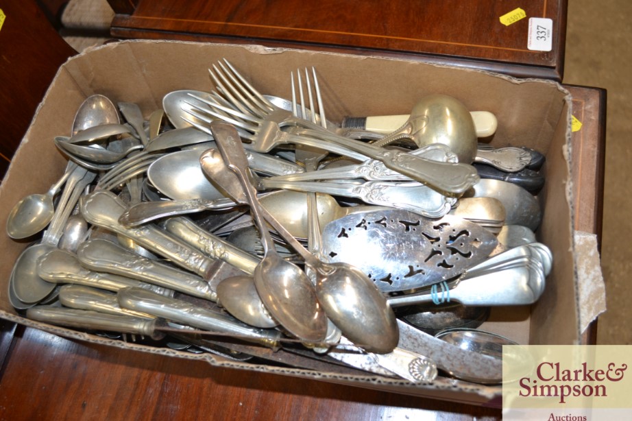 A box of miscellaneous plated cutlery