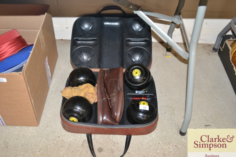 Four bowling woods in fitted case etc.