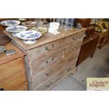 A 19th Century stripped pine chest of four long gr