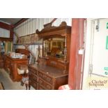 An Edwardian carved mahogany mirror back sideboard