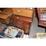 A mahogany two drawer filing chest