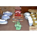 A set of vintage postal scales; an enamel mincer;