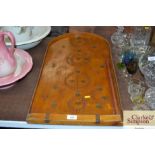 A vintage bagatelle board