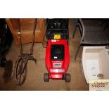 An electric Mountfield lawnmower